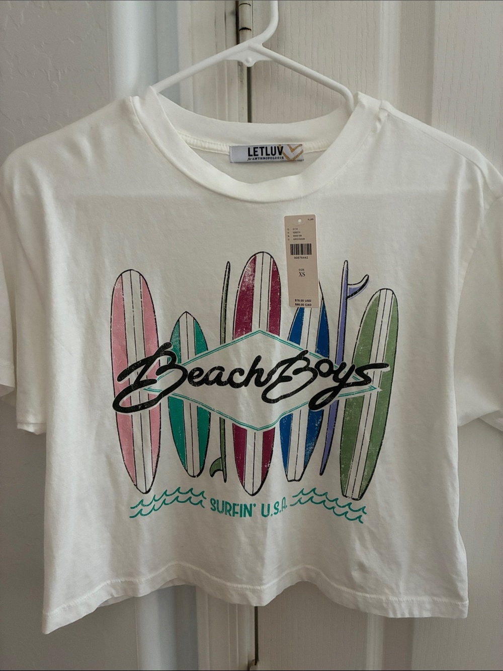 Anthropologie LETLUV Ivory Graphic Tee with Multicolor Surfboards